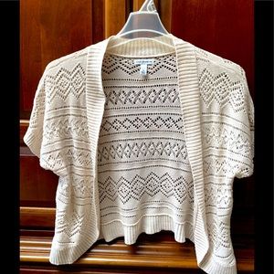 Cream colored short sleeve shrug